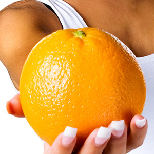 Апельсин в руке